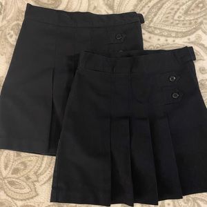 Two school uniform skirts